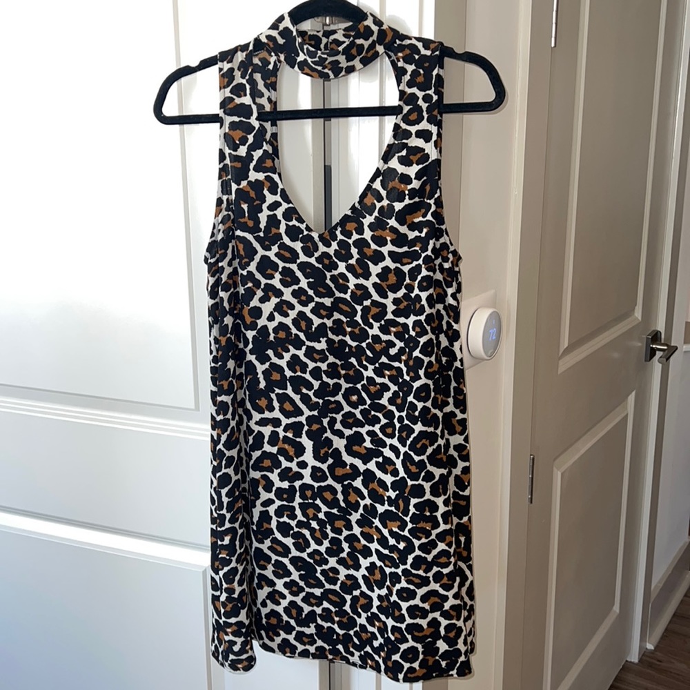 Leopard MUMU dress. Low back and cute V High neck front